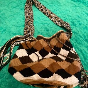 Brown toned woven purse. Only used a handful of times. Great condition.Well made